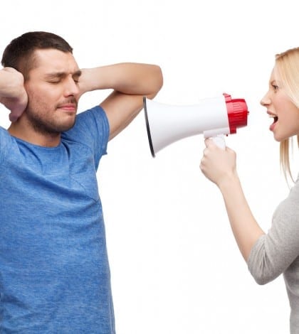 girlfriend screaming though megaphone at boyfriend