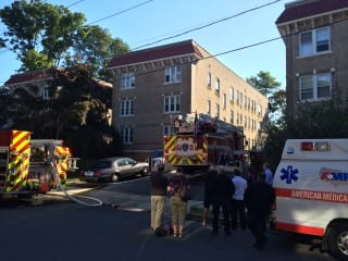 West Hartford firefighters and other emergency personnel on the scene of a fire at 8-14 Concord St. Photo credit: John Lyons.