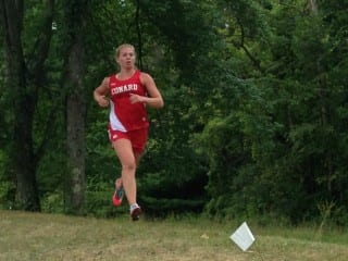 Conard sophomore Gwen Geisler finishes in first place in her first cross country meet. Photo credit: Linda Geisler.