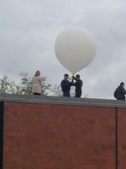 Smith STEM students in Mrs. ?? class launch a weather balloon from the roof of the school. Submitted photo.