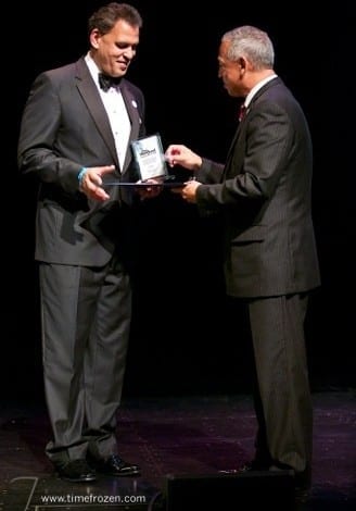 Bisgaard Accepts Award from Mayor Segarra