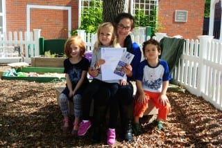ECC teacher Felica Poretsky and a few of her students with the letter from the Save a Child's Heart Foundation President. Submitted photo.