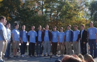 Jack Wright (far right) and the Hall A Cafella's sing the National Anthem at the 2013 Walk. Submitted photo.