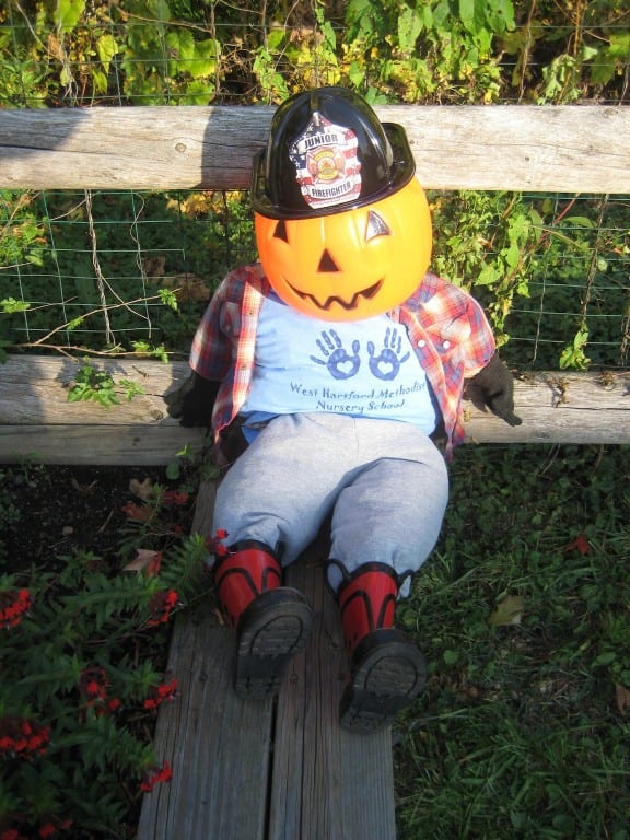 The West Hartford Methodist Nursery School Scarecrow relaxes at Auer Farm, checking out the competition! Submitted photo