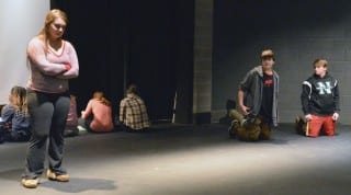 Ariana Caruso ’15 as Polly (left) rehearses a scene with Anthony Lenczewski ’16 as Odysseus and Charles Gfeller ’18 (far right) as Pete. Submitted photo.