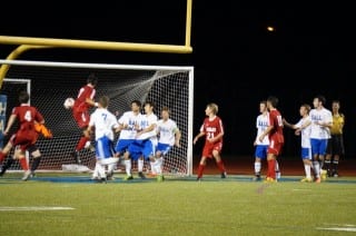 Hall goalie Jeremy Rausch makes a save in the second half. Photo credit: Ronni Newton