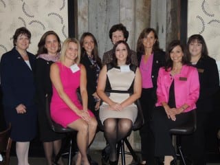 Several of the invited guests with speakers at the "Think Pink" event. Submitted photo.