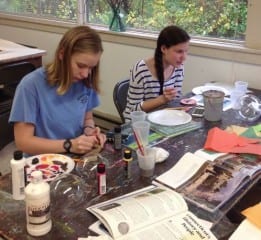 Students paint ornaments at the West Hartford Art League for display in Washington, DC's Presidential Park this holiday season. Submitted photo.
