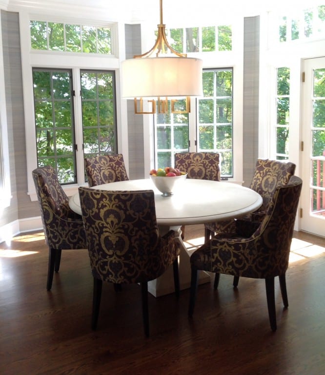 Consider the dining room's size and shape when selecting a table and chandelier. Submitted photo