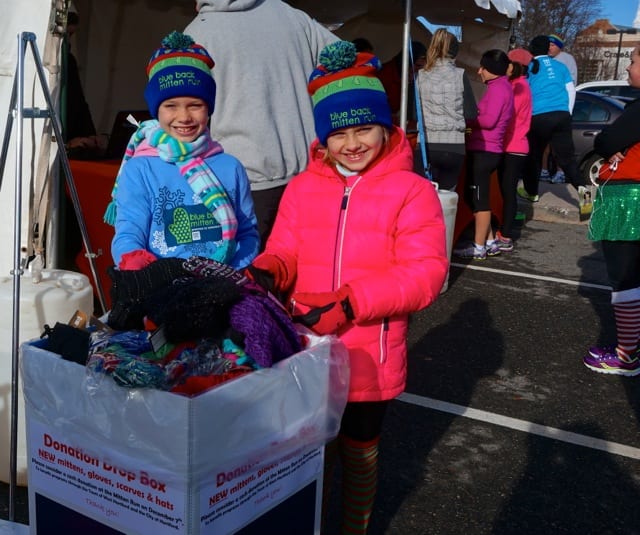 Participants donated mittens, gloves, hats, and scarves to The Town That Cares Fund. Annual Blue Back Mitten Run, West Hartford, Dec. 7, 2014. Photo credit: Ronni Newton
