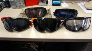 Impairment simulation goggles manufactured by Drunk Busters include low level (blue, .06-.08 BAC) through "totally wasted" (orange, .26-.35 BAC) and the cannabis goggle. Photo credit: Ronni Newton