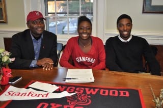 Flanked by her father, Alman Lord, and her brother Matthew Lord ’17, Melissa Lord ’15 celebrates her commitment to play tennis next year at Stanford University. Submitted photo