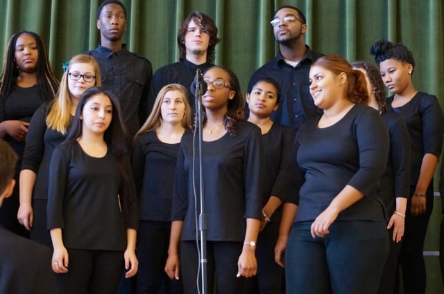 Front row (left to right) soloists Katherine RIvera, Ashley Antoine, and Destiny Torres perform 'Wanting Memories' with the rest of Conard's Voices of the World choir. West Hartford's 19th Annual Celebration of Dr. Martin Luther King Jr., Jan. 19, 2015. Photo credit: Ronni Newton