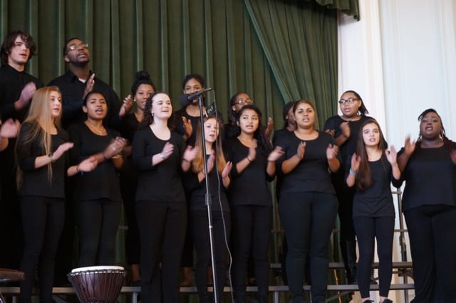 Conard High School's 'Voices of the World' choir leads the singing of 'We Shall Overcome.' West Hartford's 19th Annual Celebration of Dr. Martin Luther King Jr., Jan. 19, 2015. Photo credit: Ronni Newton