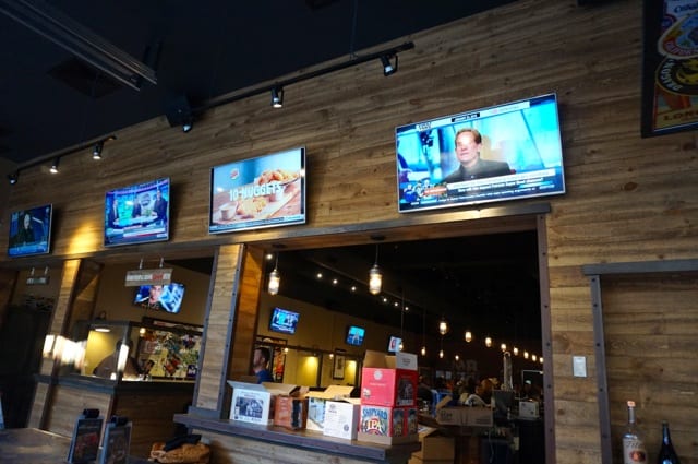 There are 24 TVs, and every sports package available at World of Beer, West Hartford, CT. Photo credit: Ronni Newton