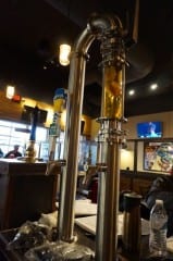 The infusion tower allows fruit, cocoa beans, and more to be infused into beer. World of Beer, West Hartford, CT. Photo credit: Ronni Newton