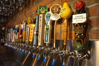 Beer taps as far as the eye can see. World of Beer in West Hartford has over 50 beers on tap, and the selections change daily. Photo credit: Ronni Newton
