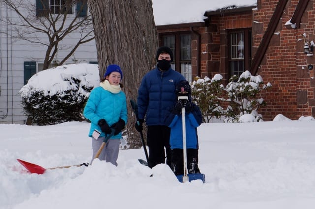 Sarah, Thomas, and Brendan Grady shovel their driveway and front walk. West Hartford, Blizzard of 2015. Photo credit: Ronni Newton