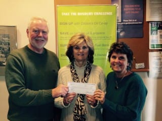 Mark Hutson (left), Citizen's Oil Co-op President, and Rosie Stanko, Citizen's Oil Co-op Vice-President, presented a check to Barbara Henry, First Selectman of Roxbury for the Roxbury Fuel Bank. Submitted photo