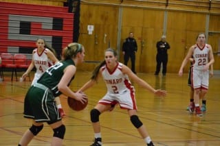 Conard freshman Delaney Connors (#2) guards her sister, NWC #22 Haley Connors. Photo credit: Liz Proietti