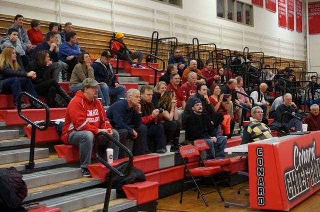 Alumni, friends, and family gathered at a ceremony to honor former Conard wrestling coach George Beaudry. Photo credit: Ronni Newton