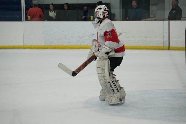 Conard goalie Zander Khan. Conard vs. Hall/Southington hockey, Feb. 23, 2015. Photo credit: Ronni Newton