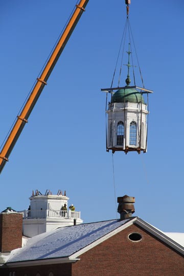 The cupola is removed by a  crane from atop Gallaudet Hall at ASD on Friday and minutes later will be lowered onto a flatbed truck. Photo credit: Rennie Polk