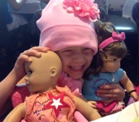 Kiley Sullivan and a few of her favorite American Girl dolls. Photo courtesy of Emily Sullivan