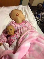 Kiley's American Girl doll, Kelly, is a constant companion. Photo courtesy of Emily Sullivan