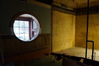 The round window will remain, but the area to the right which was formerly a pizza oven will have seating for large groups in the new Prospect Cafe. Photo credit: Ronni Newton