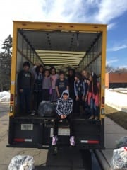Smith STEM students filled a truck with more than 2,200 pairs of donated shoes. Submitted photo