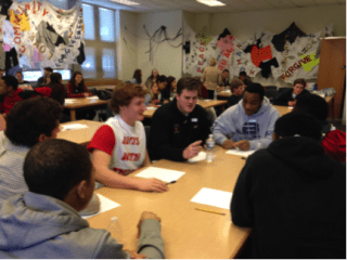 Conard football captains for fall 2015 learn about the Positive Coaching Alliance philosophy. Submitted photo