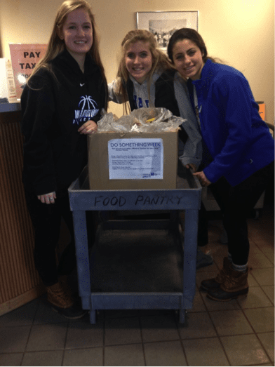 Members of the Hall Girls basketball team delivering food from the Hall food drive in February. From left: Jenna Behan, Erin O’Brien, Katie Gadue. Submitted photo 