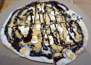 The chocolate dessert pizza is a unique specialty at Posh Tomato. Photo credit: Ronni Newton