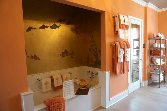 Labrazel Home and Gilley Kitchen did the master bath. They were required to retain fish painting in the tub, and used it as inspiration. 2015 Junior League Decorator Show House. Photo credit: Ronni Newton