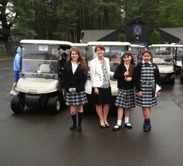 Principal Shevon Hickey with student volunteers at last year's golf tournament. Submitted photo