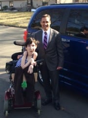 Rob Bouvier, president of Bouvier Insurance, with Adam Avery and the family's new wheelchair accessible van. Courtesy photo