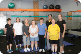 Laurie Venora (left) trains LIVESTRONG Cancer Survivors at the YMCA program at the Playground Fitness Center in West Hartford. Submitted photo