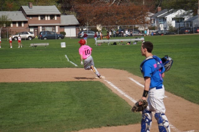 Parker Murray rounds first. Conard vs. Hall baseball. May 6, 2015. Photo credit: Ronni Newton