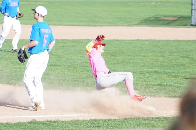 Alex White slides into 3rd base. Conard vs. Hall baseball. May 6, 2015. Photo credit: Ronni Newton