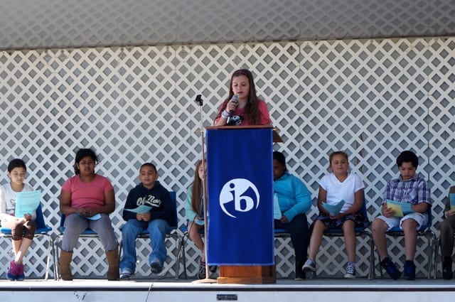 Charter Oak students speak to the audience at the ceremonial groundbreaking on May 14, 2015. Photo credit: Ronni Newton