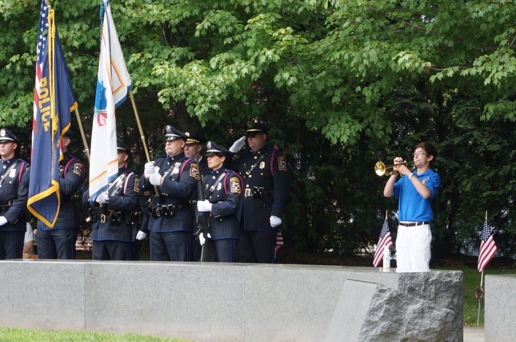 Taps is sounded by a bugler from King Philip Middle School. West Hartford Memorial Day ceremony. May 25, 2015. Photo credit: Ronni Newton