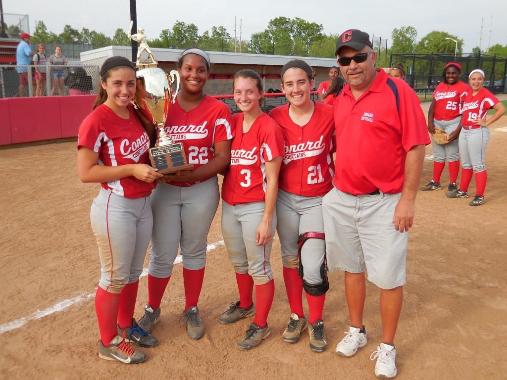 Conard captains Charlotte Leyland, Keleigh Brown, Sarah Hamilton and Sarah Hoisl pose with head coach Tom Verrengia after being presented the Mayor's Cup trophy from West Hartford Athletic Director Betty Remigino-Knapp. Submitted photo