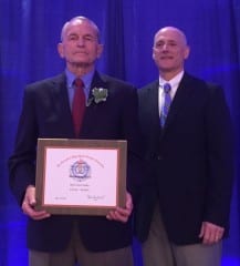 Tom Butterfield (left) was honored as Coach of the Year for Cross Country by the CHSCA on May 14, 2015. Submitted photo