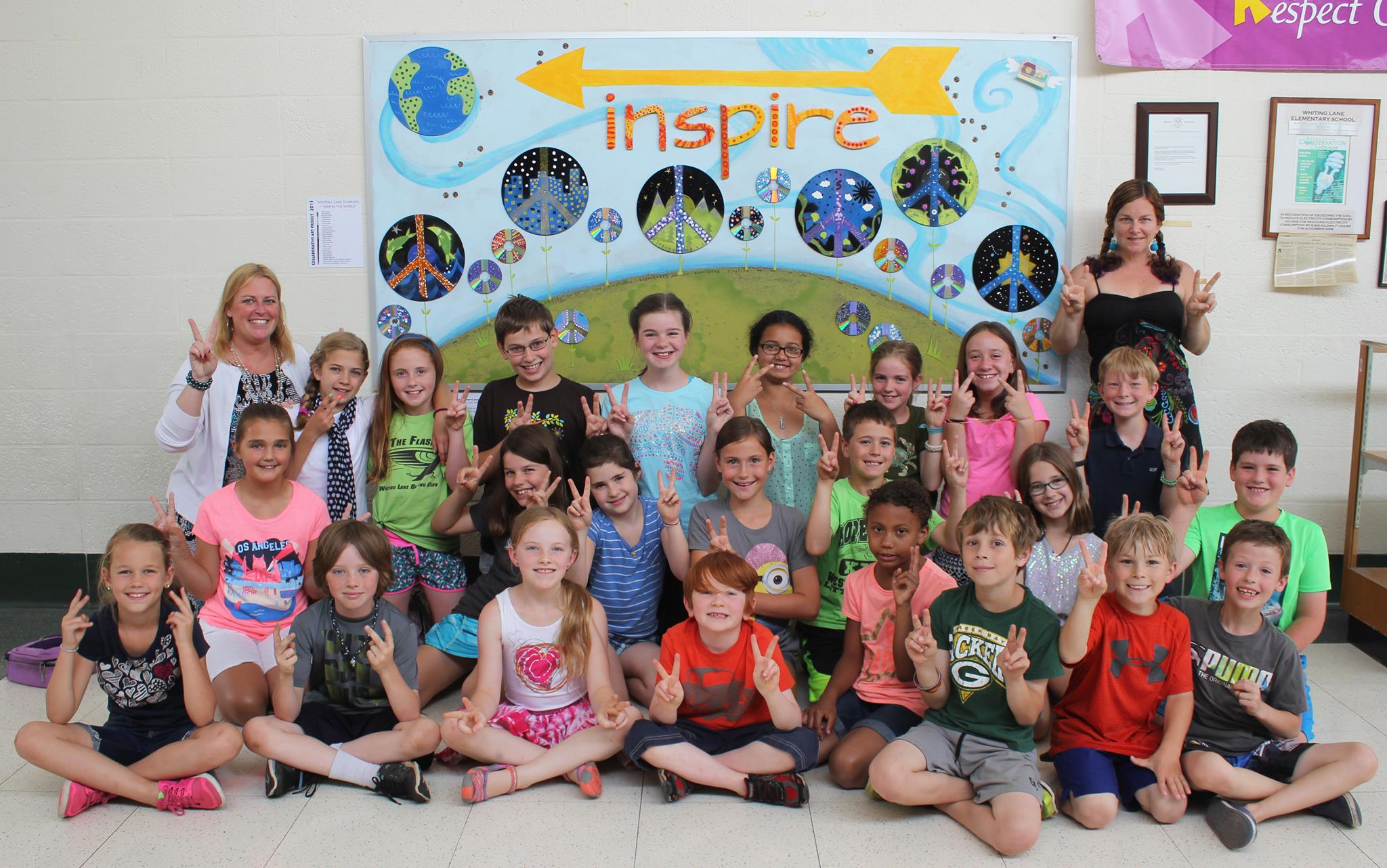 Whiting Lane students pose in front of a new work of art they created with the assistance of West Hartford artist Stefanie Marco Lantz. The piece will be permanently installed in the school's lobby. Photo courtesy of Heather Bushnell, Whiting Lane School
