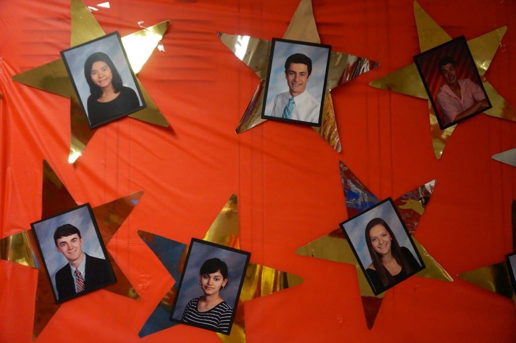 Photos of grads along the 'Hollywood Wall of Fame.' Conard Class of 2015 Safe Grad Party. Photo credit: Ronni Newton