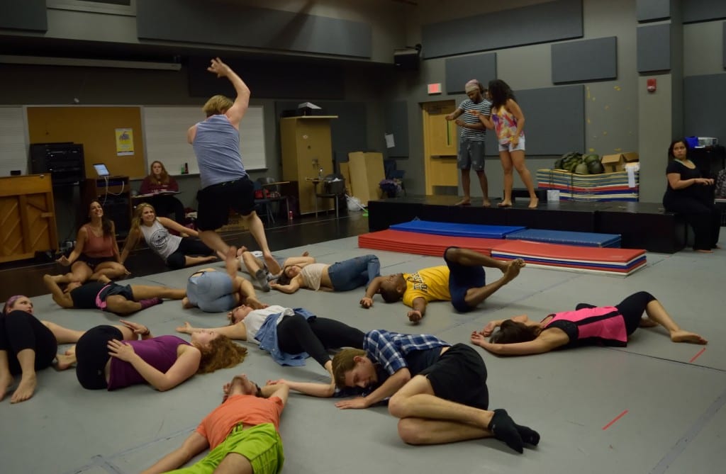 Ryan Connolly defies gravity with the ensemble cast in rehearsal. Submitted photo