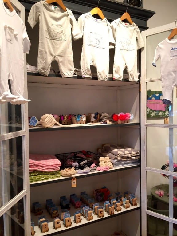 Baby clothing and gifts are for sale at Hope & Stetson. Photo credit: Ronni Newton