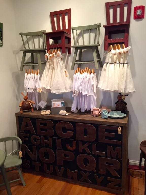 These baby clothes are for sale at Hope & Stetson, but so is the furniture on which they are displayed. Photo credit: Ronni Newton