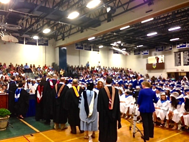 Hall High faculty watches as  students receive their diplomas. Photo by Katie Cavanaugh.
